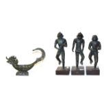 A set of three South East Asian bronzed figures of monkey musicians on wooden plinths, tallest