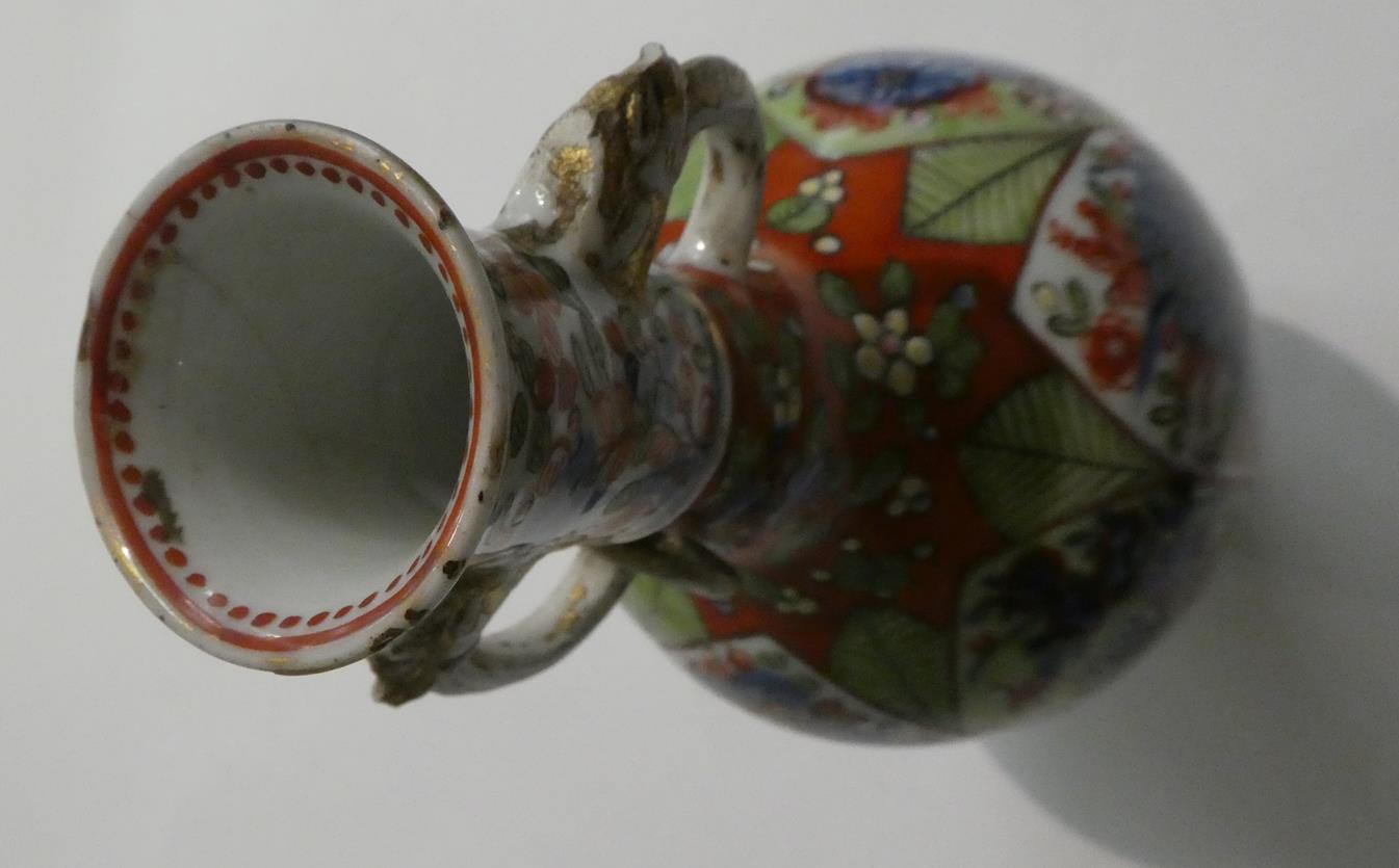 An 18th century Chinese vase of baluster form and with twin loop handles moulded with masks, painted - Image 3 of 11