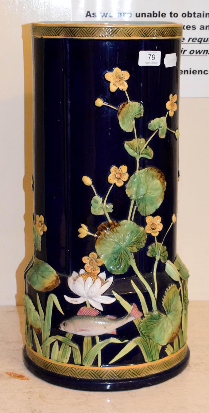 George Jones majolica stick stand moulded with water lilies and fish impressed mark, 55cm high