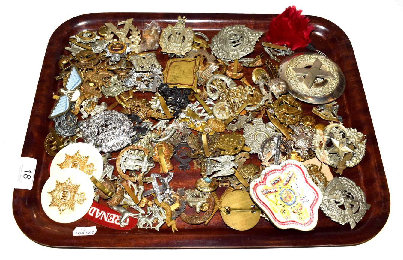 A tray of assorted military cap badges etc including King's own Scottish Borderers, Argyl &