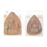 Two Buddhist earthenware figural plaques, largest 17cm high on plastic stands (2)