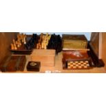 A quantity of gaming counters and related items including wooden chess pieces, a travelling chess
