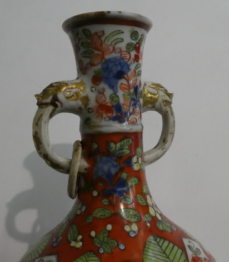 An 18th century Chinese vase of baluster form and with twin loop handles moulded with masks, painted - Image 5 of 11