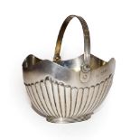 A Victorian silver sugar basket with swing handle by Hukin & Heath, London, 1888, 151 grams, 13cm