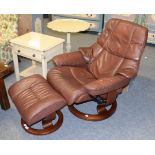 An Ekornes Stressless brown leather armchair and footstool