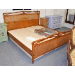 A French style caned hardwood bed, super king sized 192cm by 212cm, 110cm high