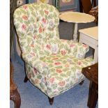 A Liberty & Co. button back occasional chair, the fabric printed with autumnal leaves