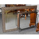 A modern wrought iron framed mirror and another modern rectangular over mantel mirror (2)