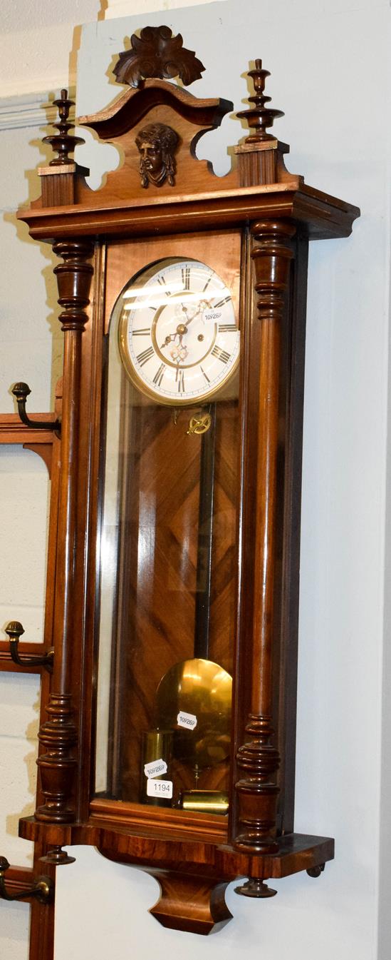 A Vienna type double weight driven wall clock, circa 1890, 115cm high