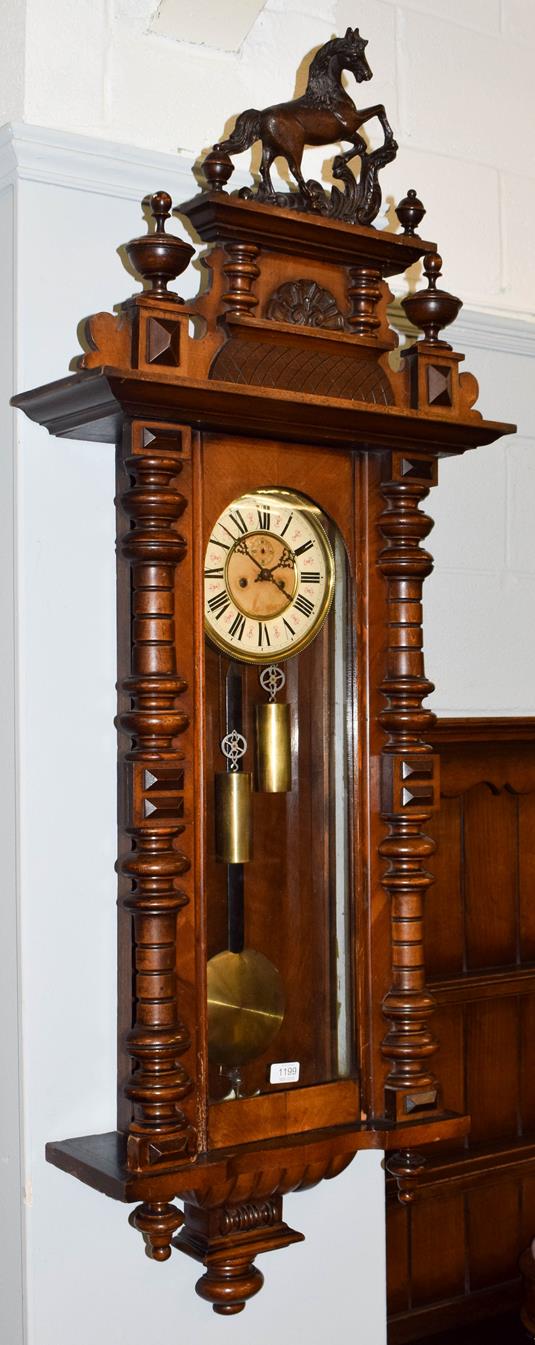 A Victorian Vienna type double weight driven wall clock, circa 1890, 120cm high