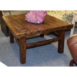 A rustic elm plank top coffee table composed of period elements, 93cm by 88cm by 51cm