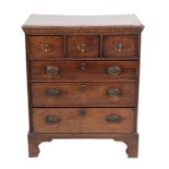 A George III Oak Straight Front Chest of Drawers, 2nd half 18th century, the moulded top above three