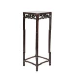 A Chinese Padouk Wood Plant Stand, late 19th/early 20th century, of square form above an open