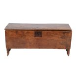 A Late 17th Century Elm Chest, of six plank construction, the moulded hinged lid above an iron