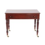 A 19th Century Mahogany Writing Table, in the manner of Gillows, the moulded top above two small