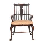 A Thames Valley Style Ash and Elm Windsor Armchair, the comb shaped top rail above a solid splat