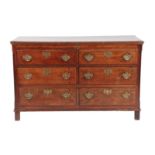 A George III Oak Mule Chest, late 18th century, the moulded hinged lid enclosing a candle box, with