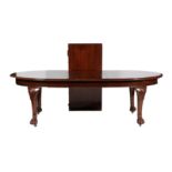 A Late Victorian Mahogany Extending Dining Table, circa 1890, of D shape form, with two additional