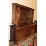 ~ A George III Oak and Mahogany Crossbanded Dresser and Rack, the associated top with three fixed
