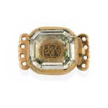A Stuart Crystal Clasp, the emerald-cut rock crystal laid upon a hairwork and wirework plaque,