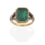 A Georgian Emerald and Diamond Ring, the emerald-cut emerald in a yellow millegrain setting, to