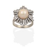 A Pearl and Diamond Cluster Ring, the central button pearl within an undulating border of eight-