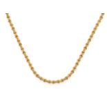 An 18 Carat Gold Fancy Link Chain, the yellow textured rectangular links spaced by plain polished