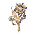 A Sapphire and Diamond Floral Brooch, circa 1940s, one flower formed of a round cut sapphire