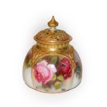 A Royal Worcester pot purri vase and cover painted with roses, puce mark 12cm high 1923 .