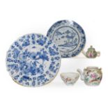 A tray of Chinese porcelain including a Kangxi blue and white dish painted with flowers under a