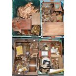 Four boxes of clock, watch parts and tools. Estimate £80-120
