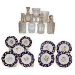 A Victorian floral painted porcelain part dessert service comprising six plates, two circular tazzas