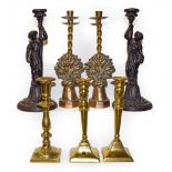 A pair of Victorian Neo-Classical style cast-metal figural candlesticks with various other