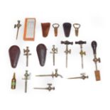 A collection of assorted champagne taps of various designs and makers.