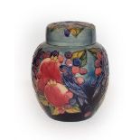 A modern Moorcroft ginger jar and cover decorated in the finches pattern with signed base