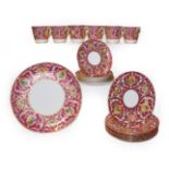 Royal Worcester tea wares decorated with vignettes of birds on a gilt highlighted pink ground