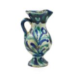 An Islamic Faience Small Ewer, probably Damascus, 18th/19th century, of baluster form, painted in