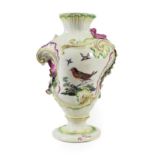 A Derby Porcelain Rococo Scroll Vase, circa 1765, of asymmetric baluster form, painted with exotic