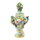 A Meissen Porcelain Flower Encrusted Vase and Cover, late 19th/early 20th century, with floral