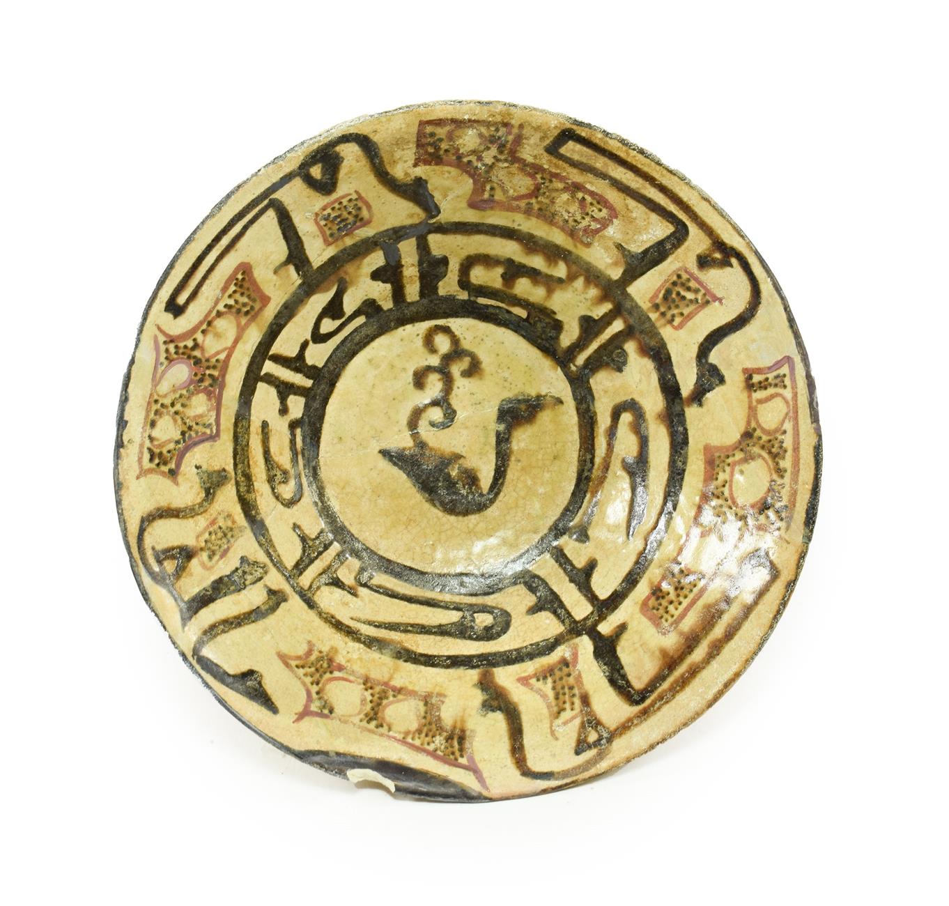 An Abbasid Painted Earthenware Bowl, probably Samarkand, 10th century, painted in manganese, red and