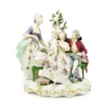 A Meissen Style Porcelain Figure Group, late 19th century, modelled and painted as an 18th century