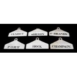 ~ Six Creamware Bin Labels, 19th century, inscribed in black HOCK, CHAMPAGNE, PORT, P BRANDY, CLARET