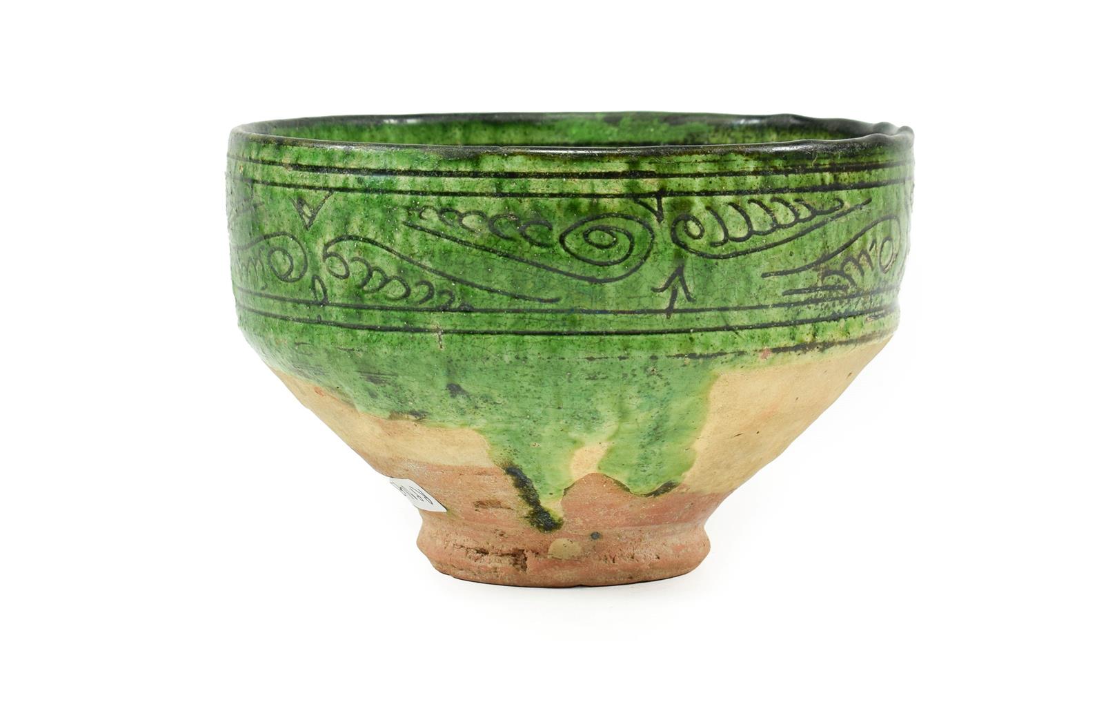 A Garrus Green Glazed Earthenware Bowl, 12th/13th century, carved and incised through the black slip - Image 2 of 2