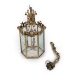 A Late Victorian Brass Lantern of Hexagonal Form, the central plain shaft issuing three nozzles, the