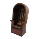 A Porter's Chair, 19th century, with arched canopy and flared rounded back, the seat with squab