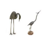 An Early 20th Century Lead Figure of a Heron, 127cm high; and Another Similar Figure, cast in bronze