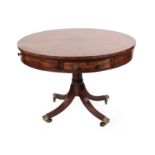 A George III Mahogany Drum Top Library Table, early 19th century, the circular crossbanded top above