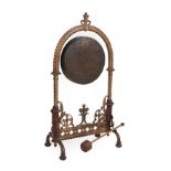 A Victorian Cast Metal Dinner Gong, 3rd quarter 19th century, the moulded frame with egg and dart