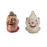 Two Continental Papier-Mache Parade Masks, circa 1940, one modelled as a grinning Pierrot clown, the