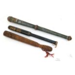 Three William IV Painted Walnut Truncheons, one with button topped domed pommel, the blue field